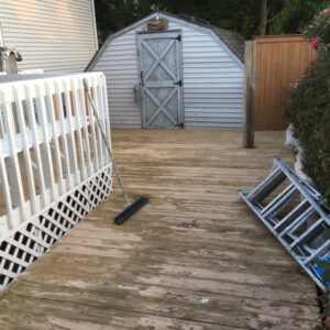 A deck that has been stripped of all the wood.